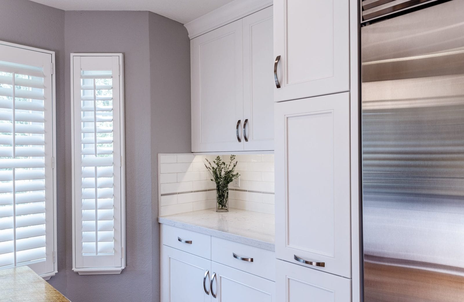 coffee nook with white cabinetry