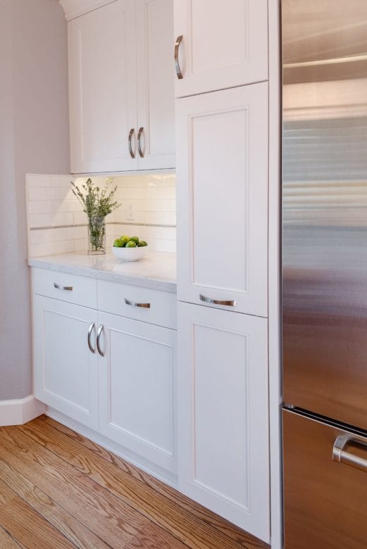white cabinetry pantry space in kitchen remodel