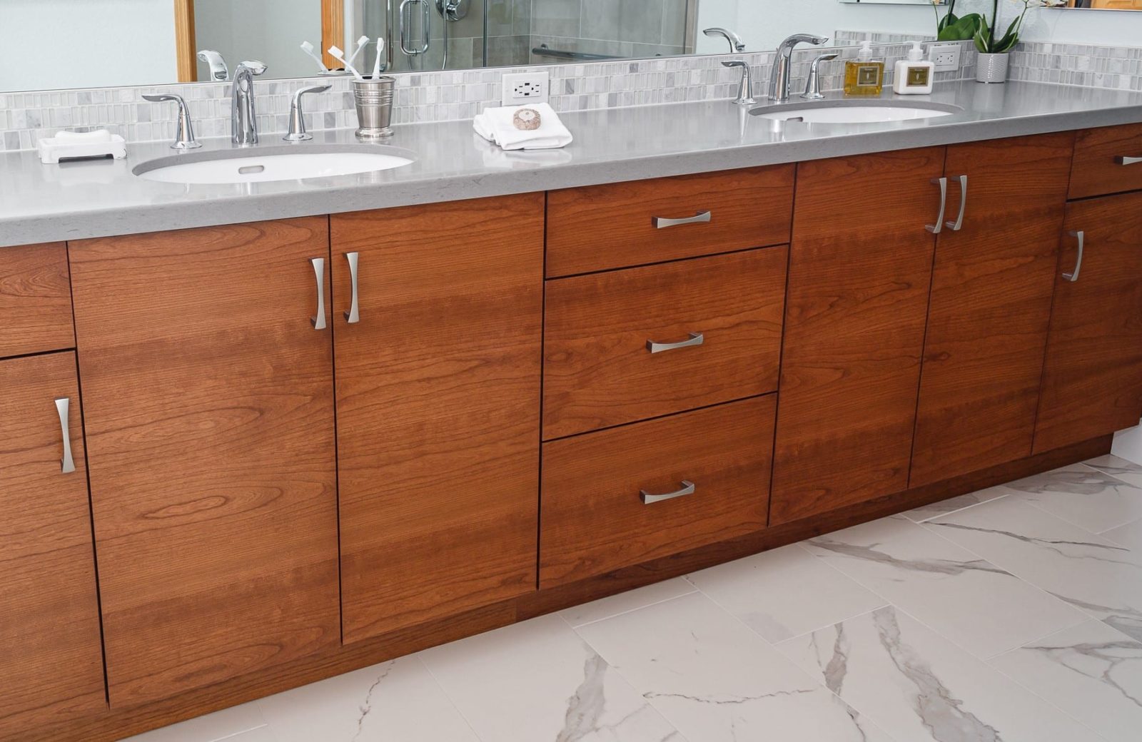 Pleasant Hill master bath with single grain wood cabinets, quartz countertops
