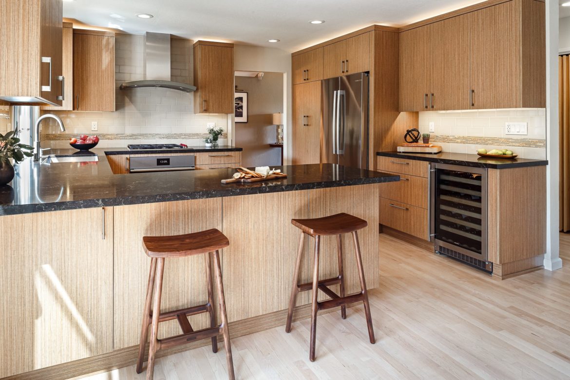 Transitional kitchen with peninsula and wine fridge