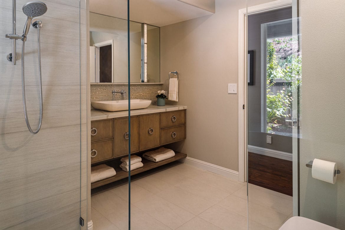 hall bathroom remodel with custom vanity and backsplash tile