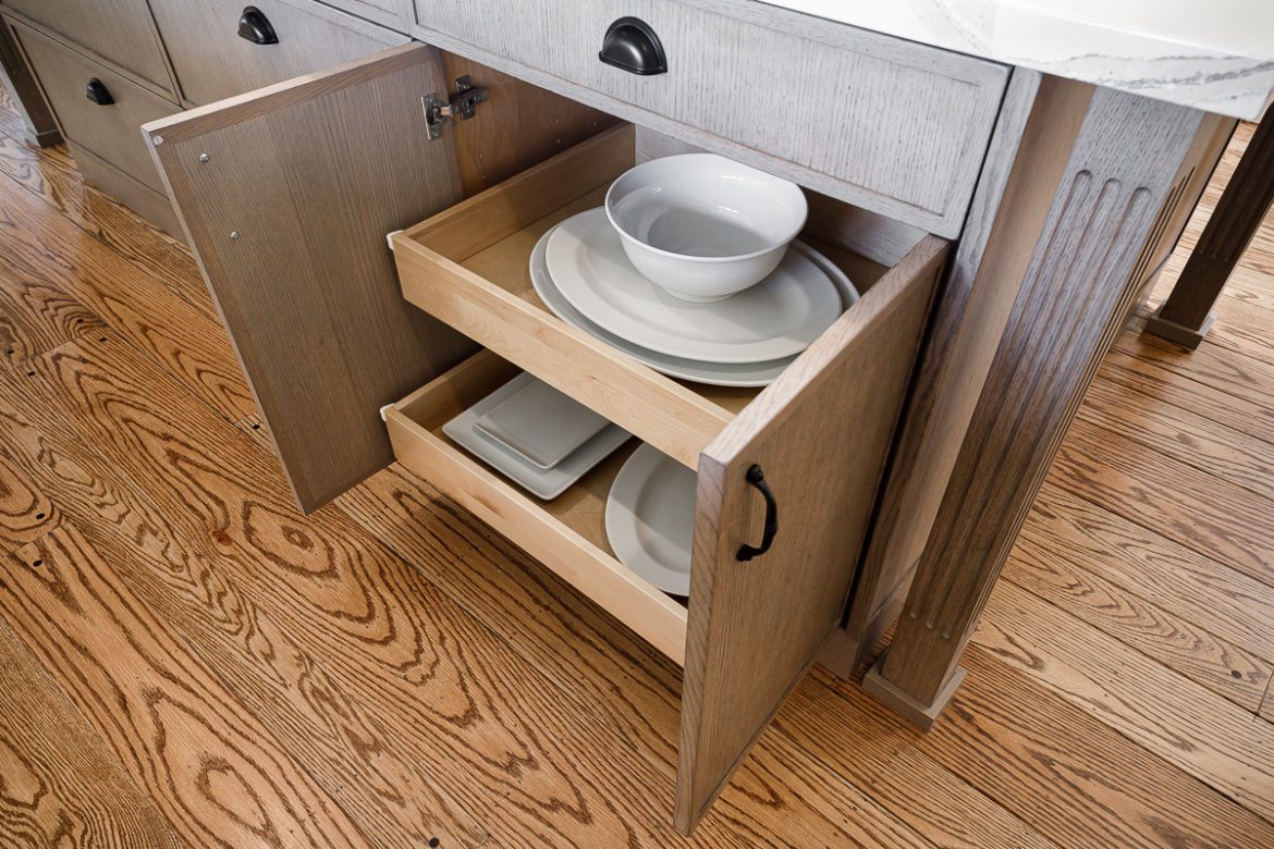 modern rollout shelves in a base cabinet