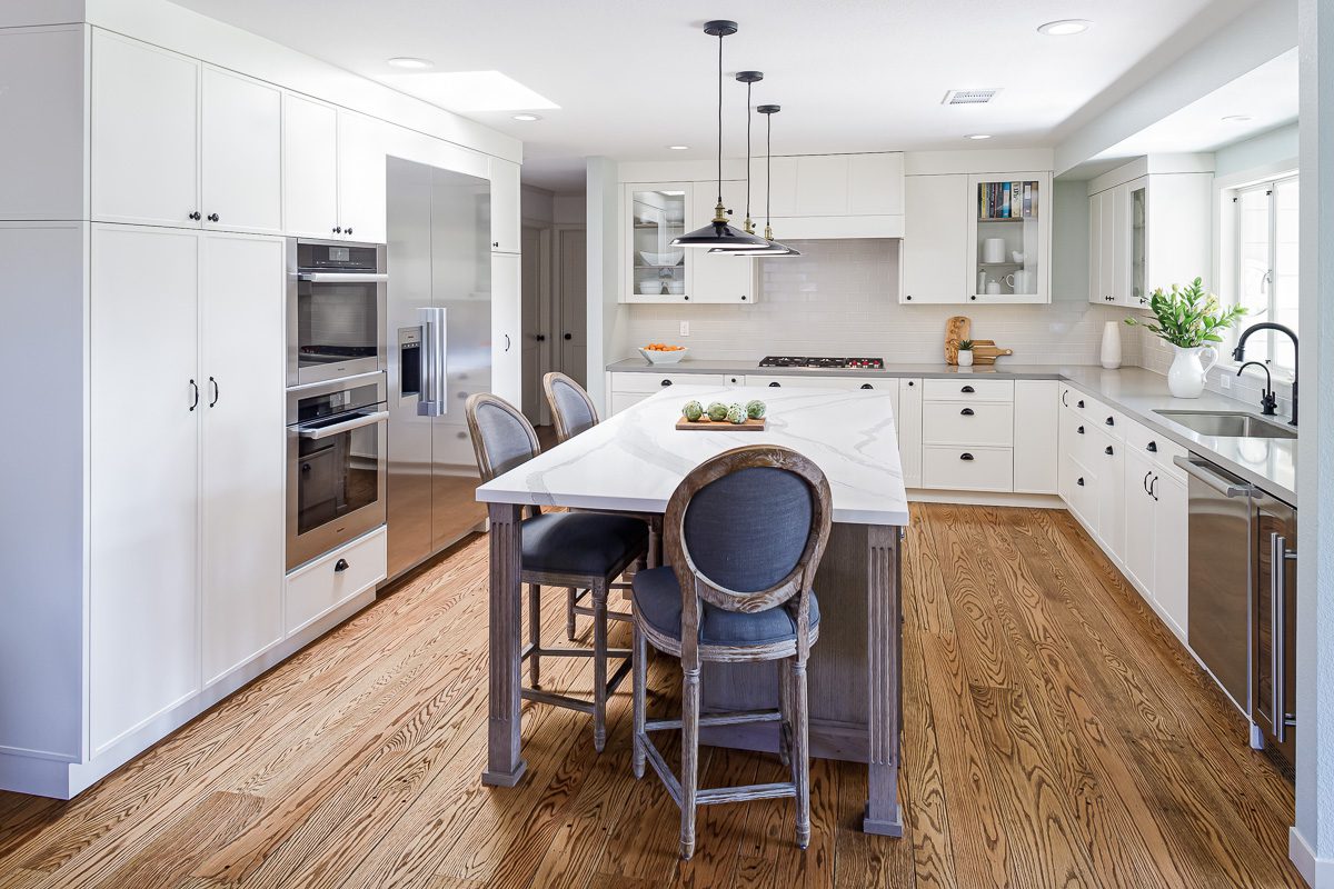 stainless steam oven in white kitchen