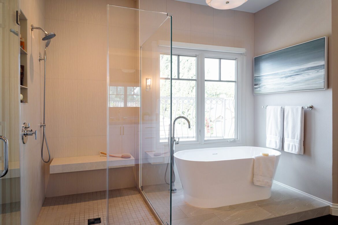 primary bathroom with spacious shower and soaking tub