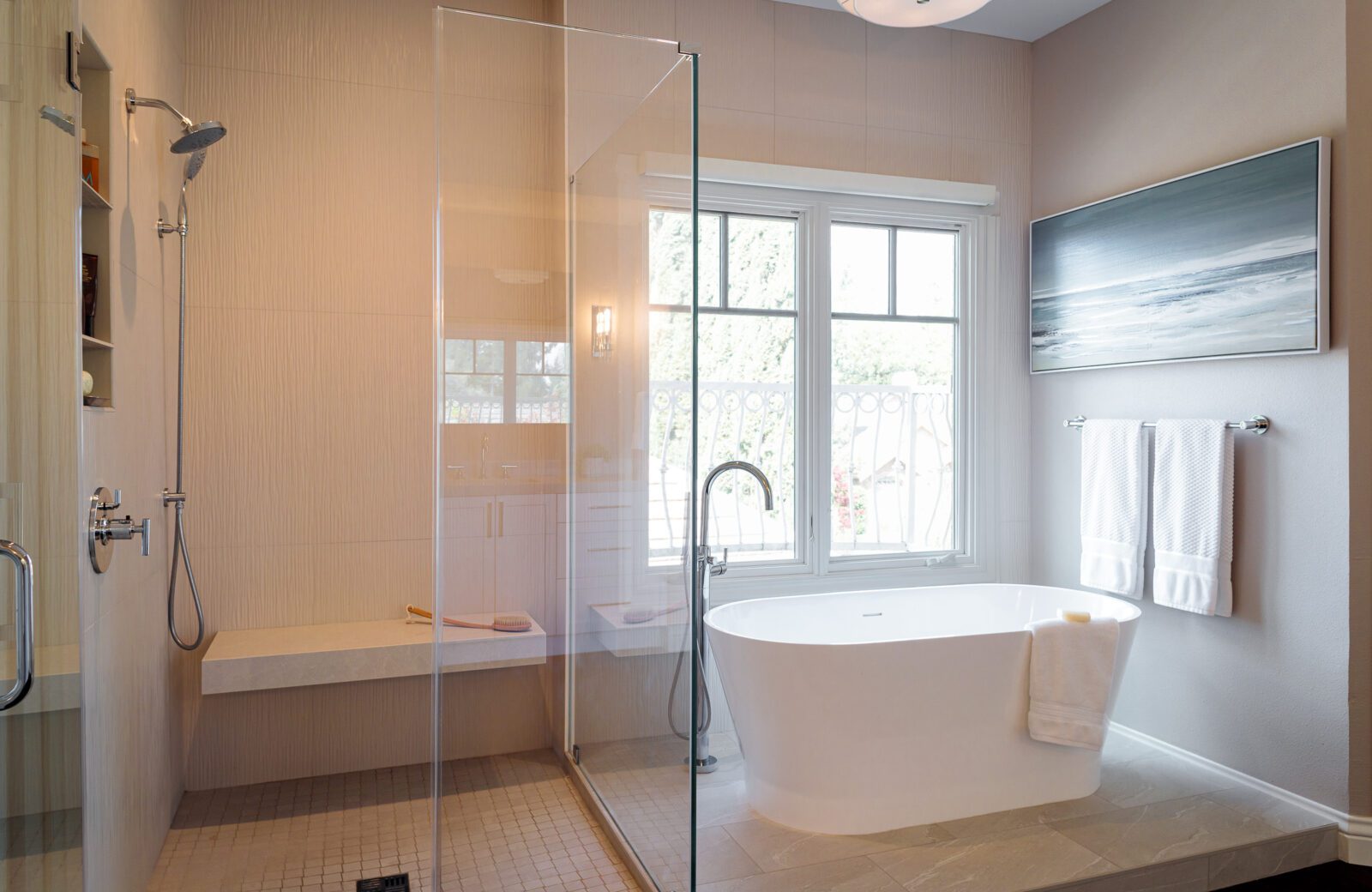 primary bathroom with spacious shower and soaking tub