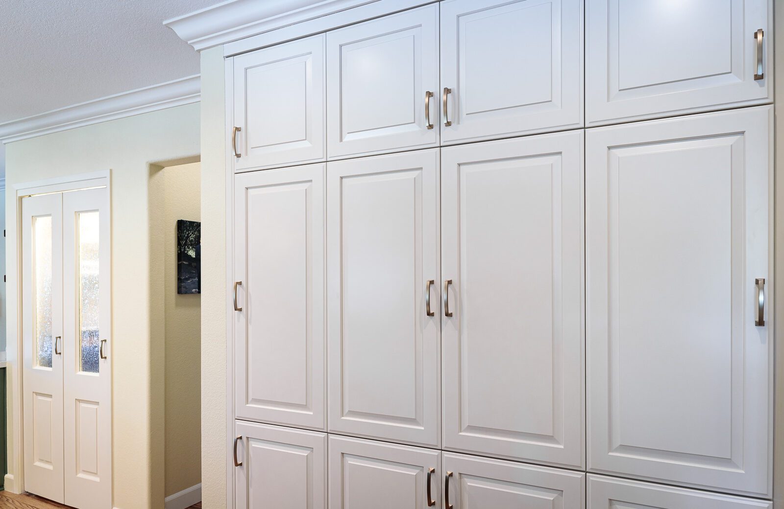 white painted cabinets, pantries