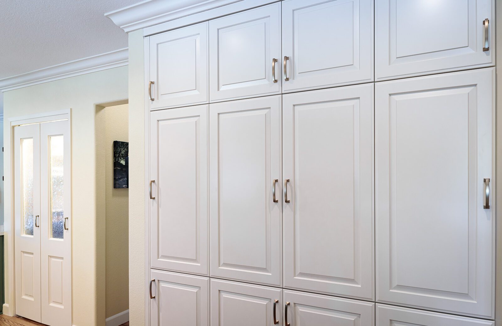 white painted cabinets, pantries