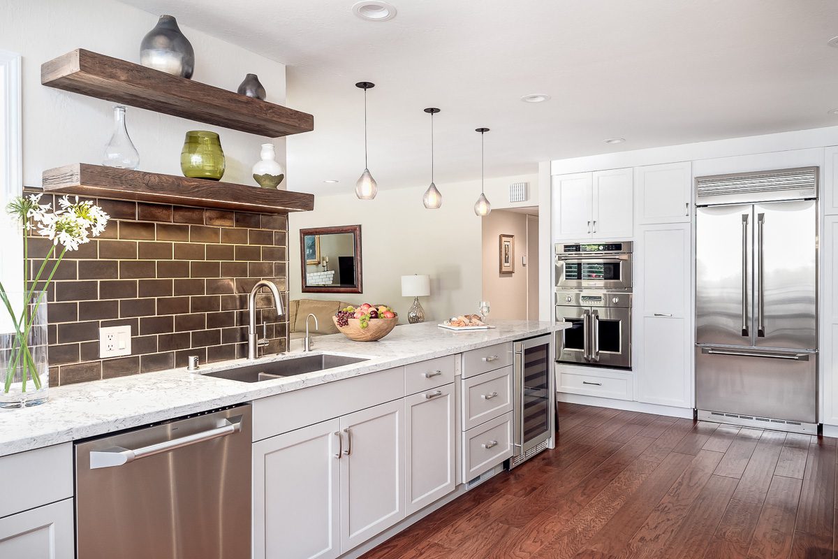 175k Kitchen Remodel budget Taupe and White Kitchen Cabinets with island and wood floors