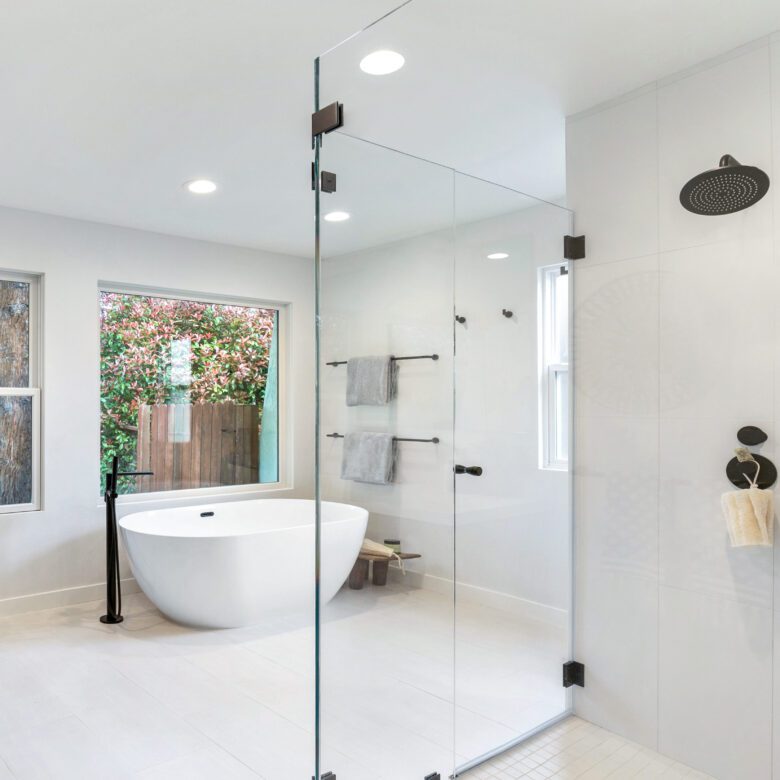 Primary Bathroom remodel, freestanding tub, tile floor, glass shower panel