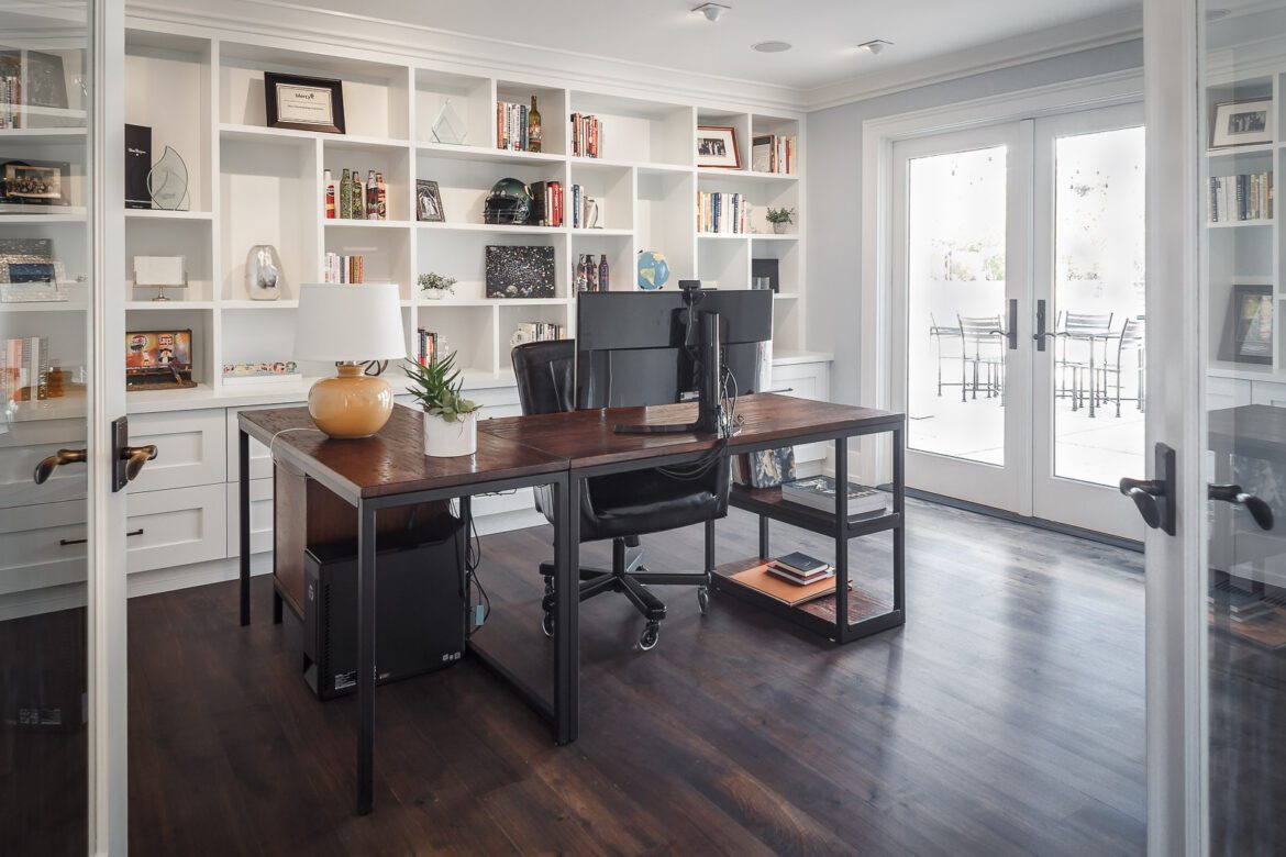 home office remodel large custom built in white bookcase hardwood floor