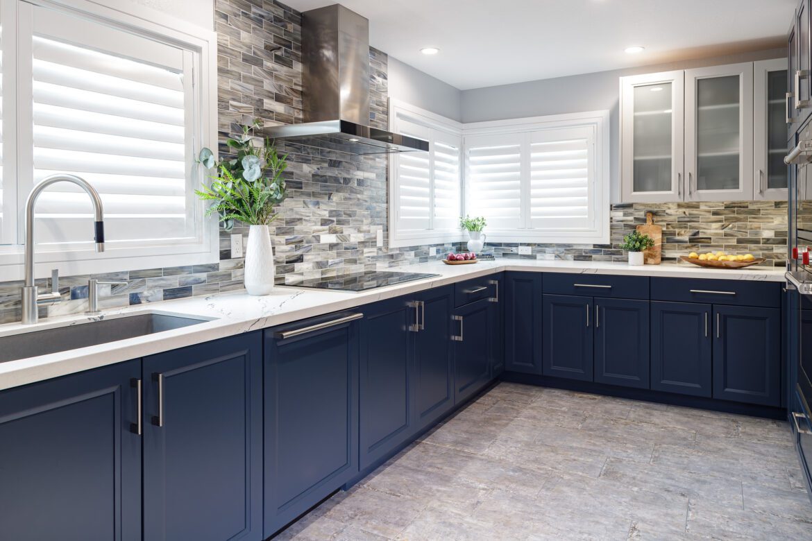 kitchen remodel, white quartz countertops, gray tile floor, dark blue cabinets