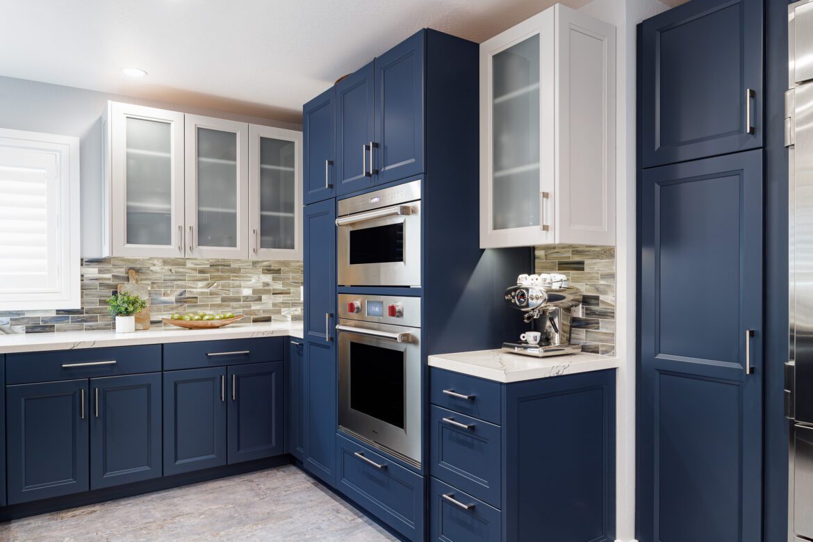 kitchen remodel, Wolf wall oven, Wolf speed oven, glass door white kitchen cabinets, dark blue base cabinets
