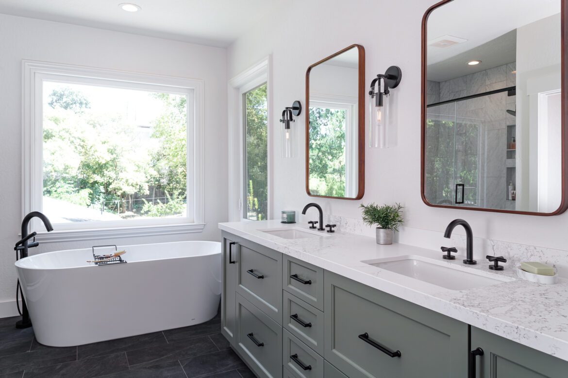 primary bathroom remodel, Green vanity, painted cabinets, stand alone white tub, slate floor