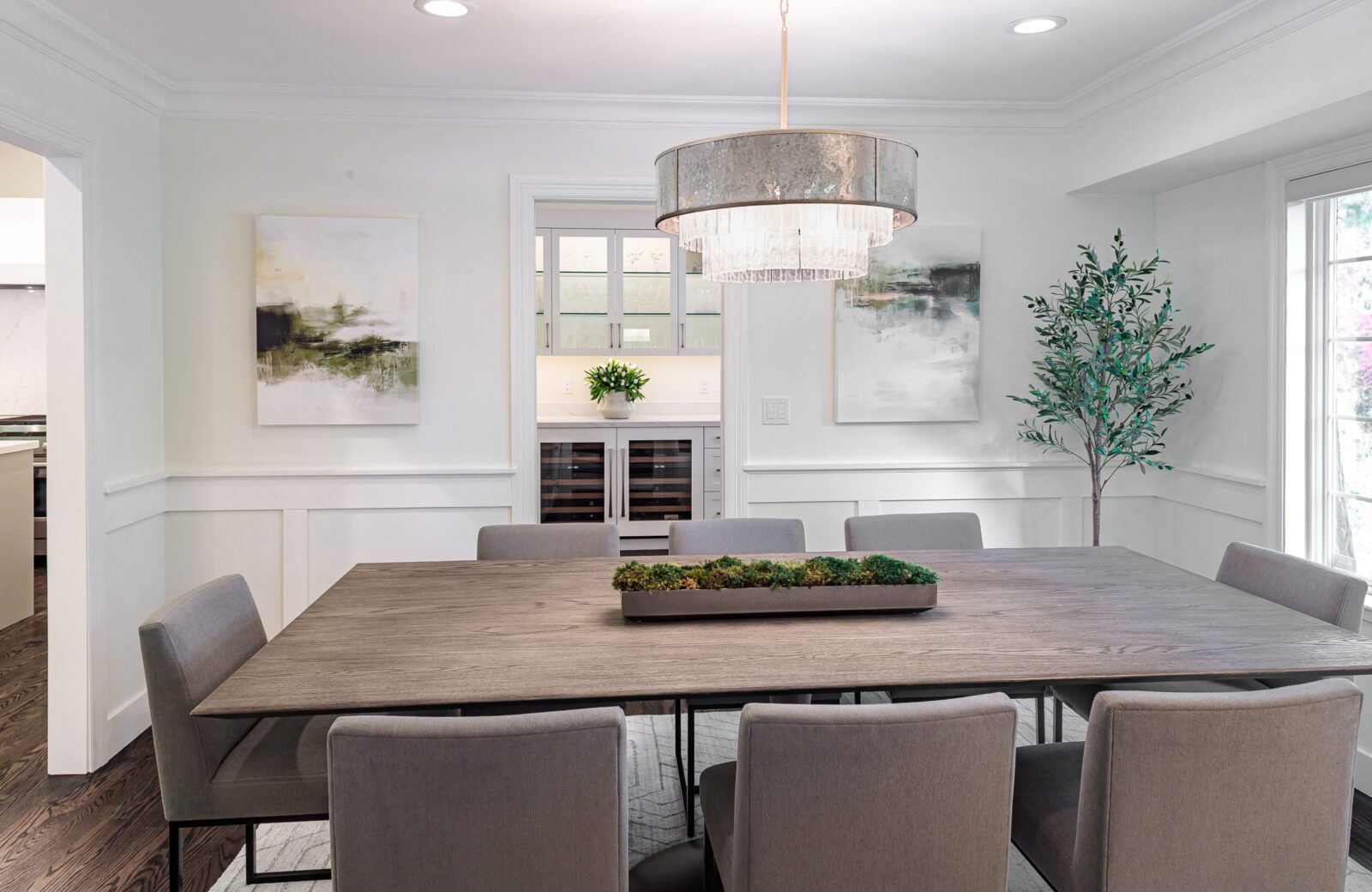 paneled dining room, large chadeliere, butlers pantry