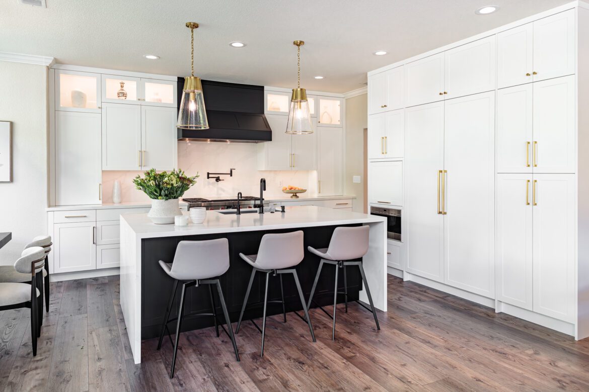 Large pantry cabinets, black and white island