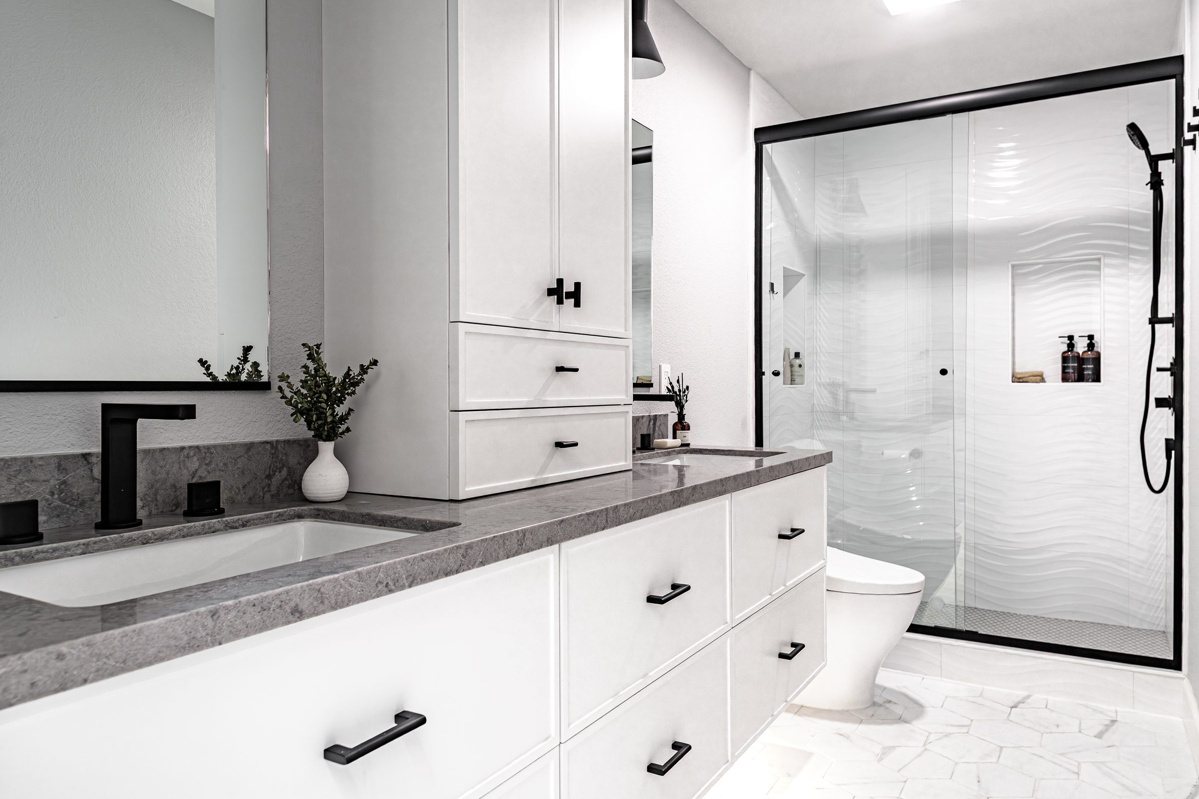 white hall bathroom remodel with black accents, cabinet on countertop double sinks danville ca
