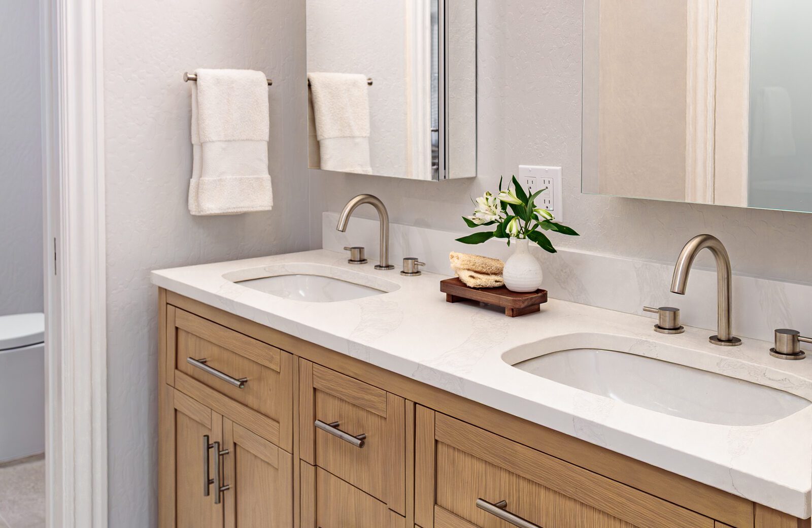 white and wood bathroom remodel, wood vanity, double sink, quartz countertop, kohler fixtures