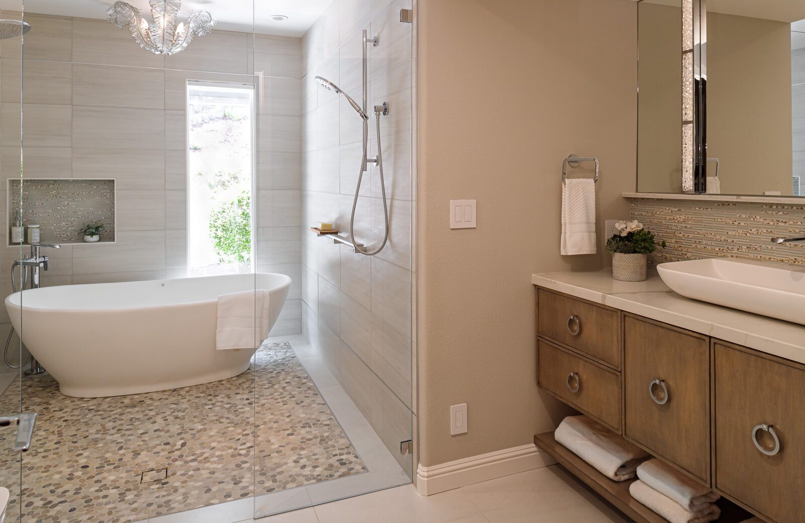 Large hall bath with wood standard vanity anchoring the space