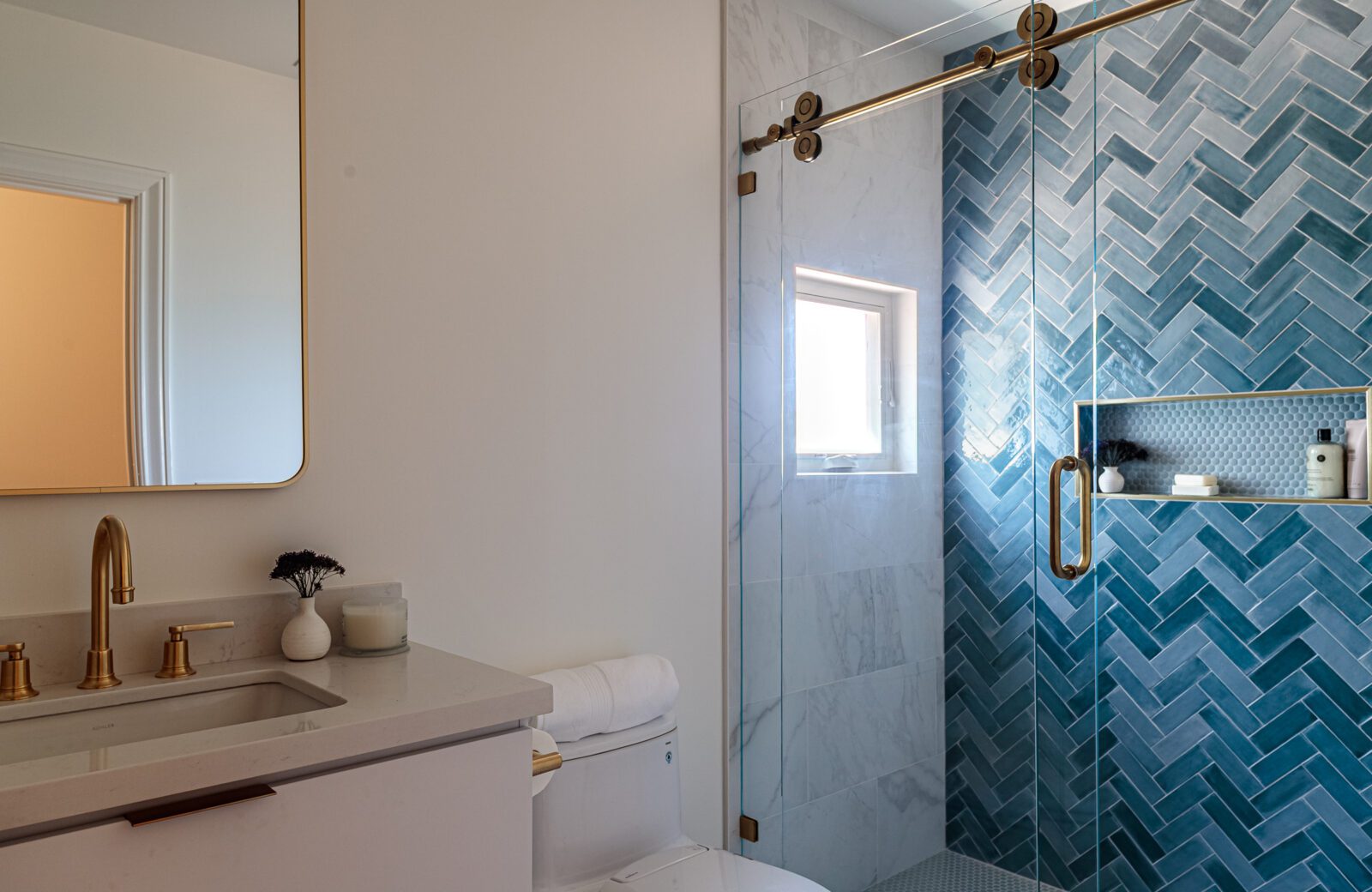 kids bathroom remodel, chevron tile wall, brass fixtures