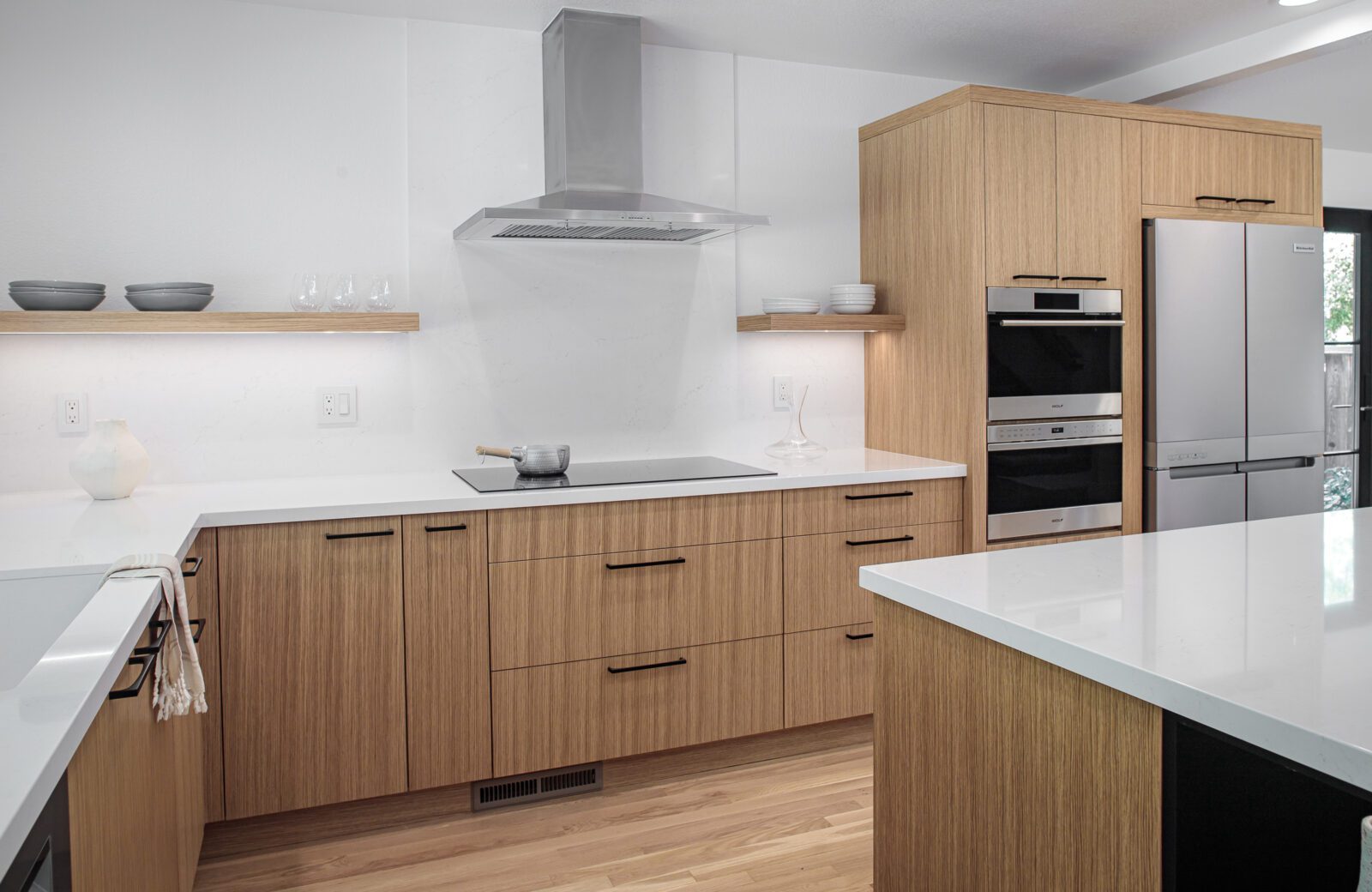 japandi Kitchen remodel with slab front oak cabinets, zephyr hood, induction cooktop walnut creek ca