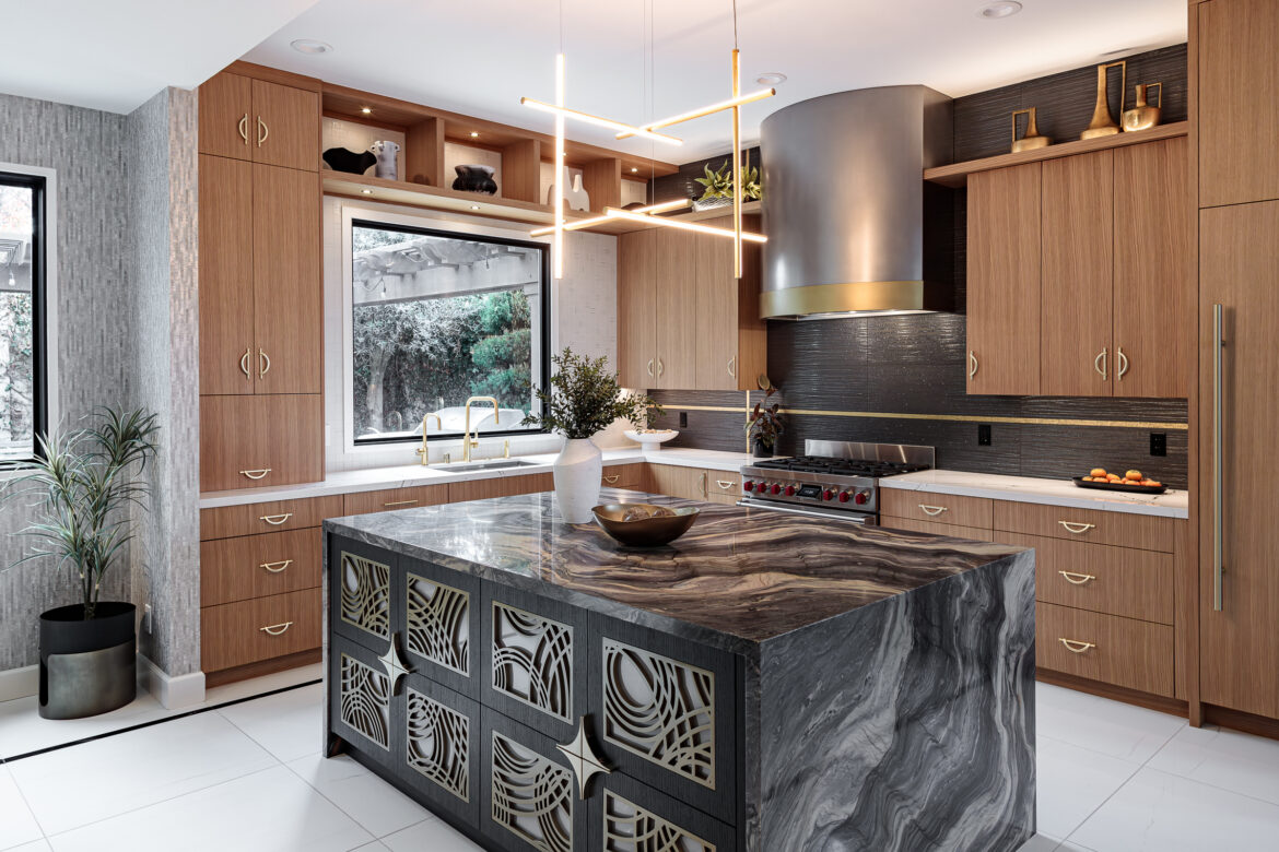 rift cut oak cabinets, lighted upper cabinets, quartzite waterfall countertop, custom hood