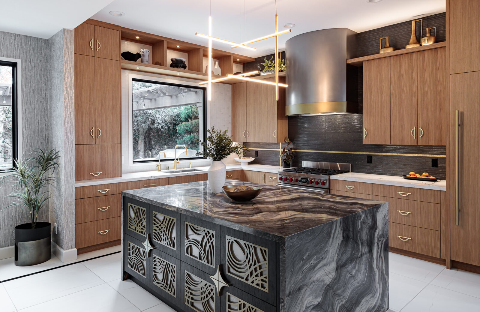 rift cut oak cabinets, lighted upper cabinets, quartzite waterfall countertop, custom hood