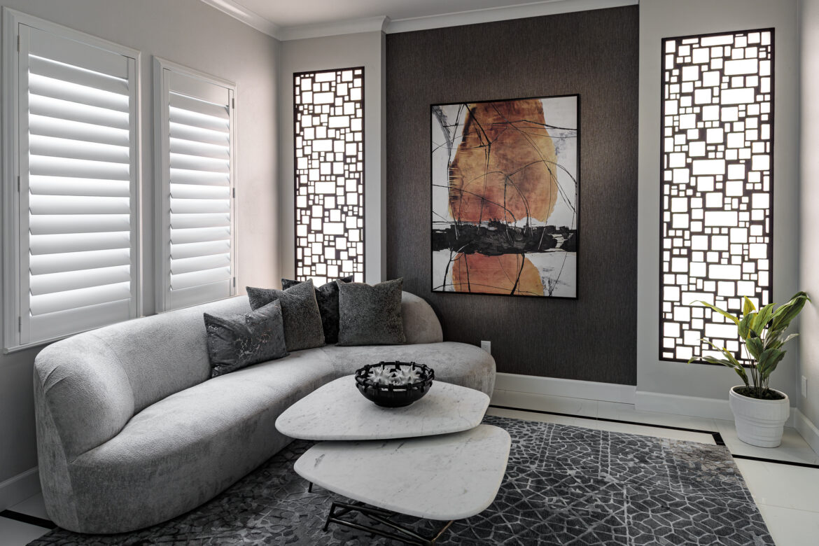 custom entryway lounge area with lighted cutout wood panels