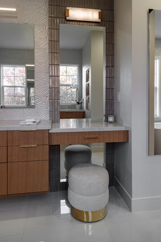 primary bathroom remodel with lighted makeup area
