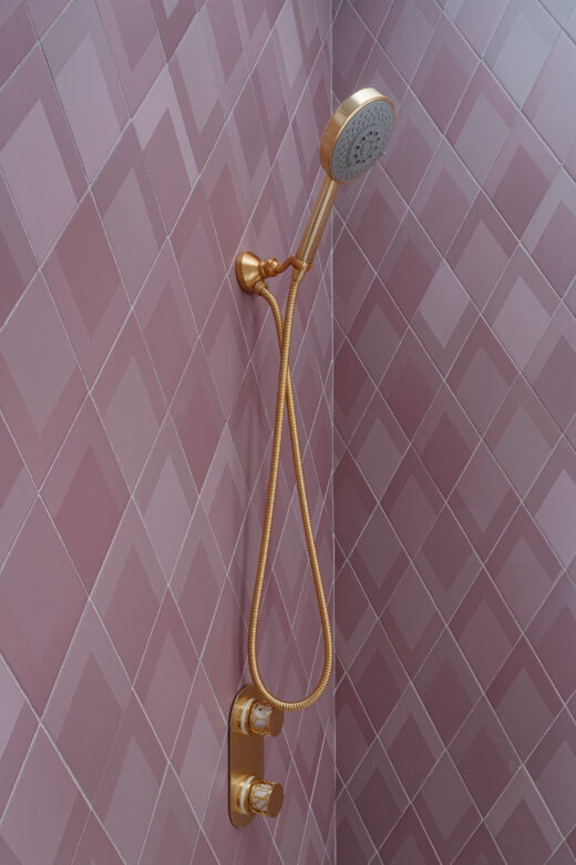 Girls bathroom remodel, pink tile and gold fixtures