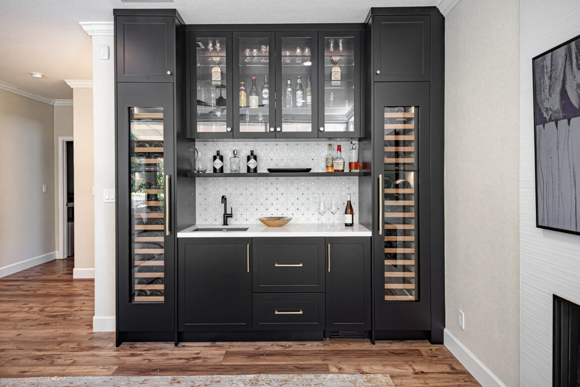 family room bar remodel, full-height Sub-Zero wine refrigerators, Marble and glass tile backsplash