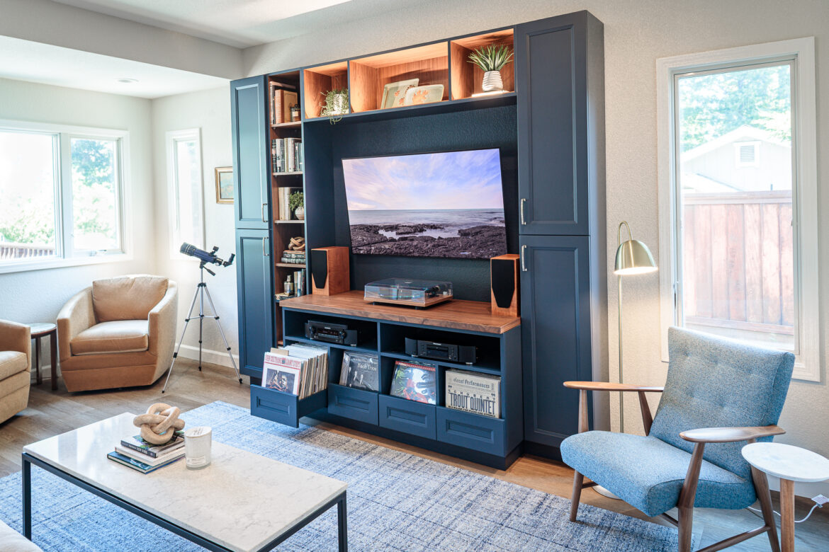 Custom entertainment center, Floor-to-ceiling built-in cabinetry, Walnut display shelving