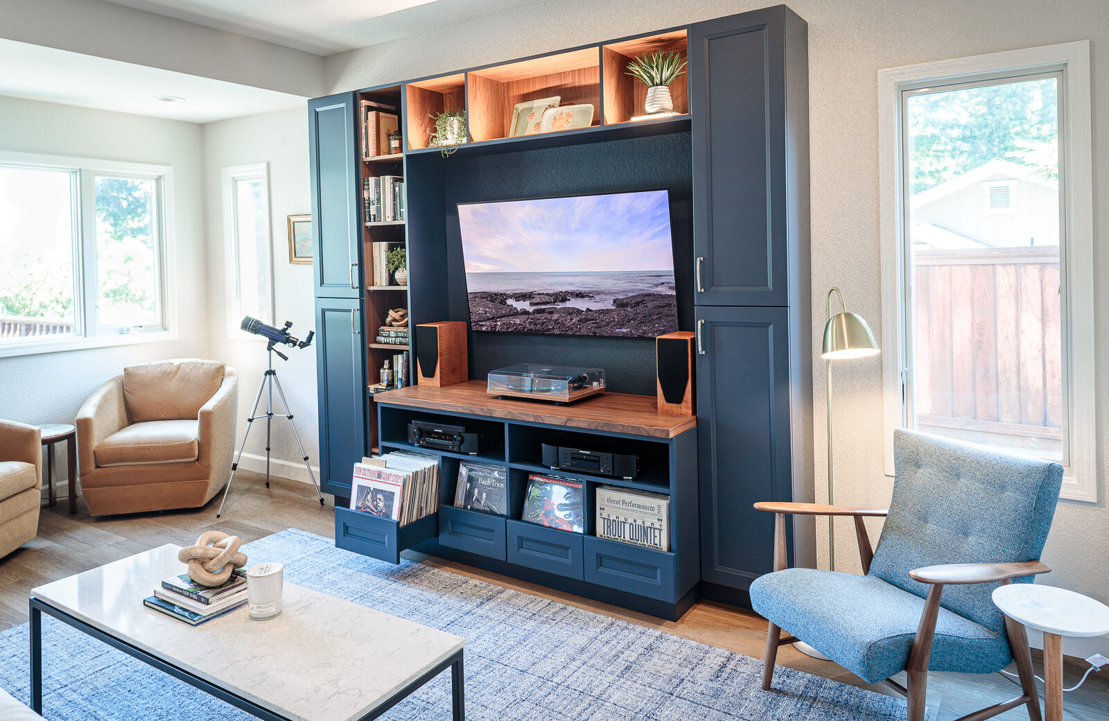 Custom entertainment center, Floor-to-ceiling built-in cabinetry, Walnut display shelving